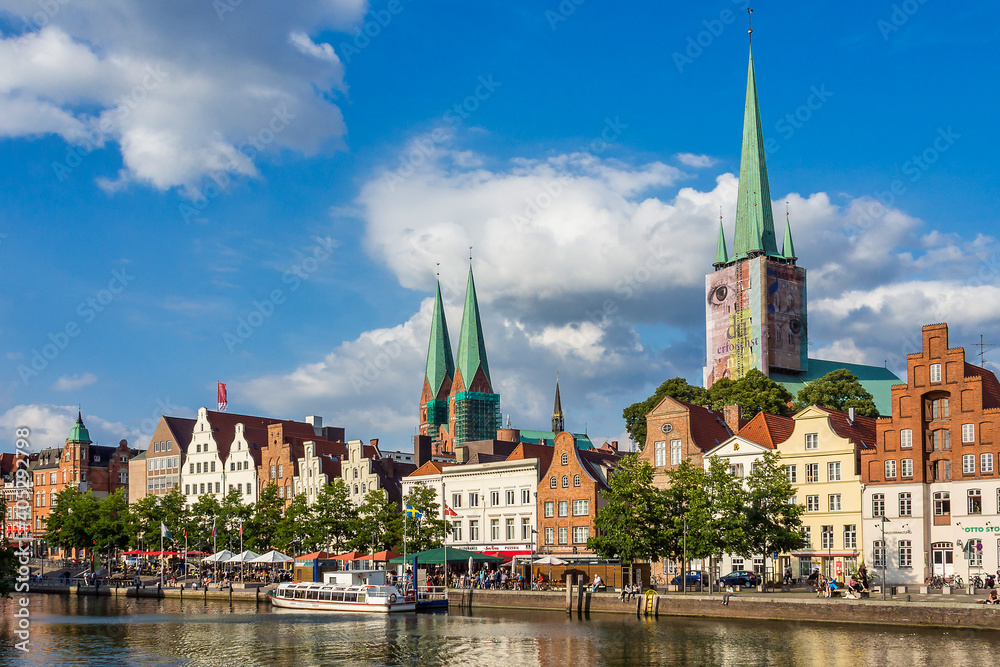 Sunset view of the Old Town pier architecture in Lubeck, Germany