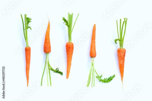 Fresh carrots on white background.