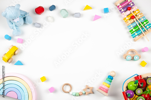 Baby kids toys frame on white background. Top view. Flat lay. Copy space for text