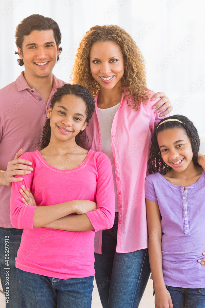Portrait of parents with daughters (10-13)