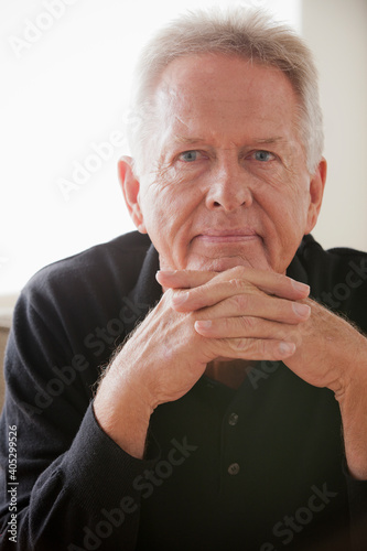 Portrait of thoughtful senior man photo