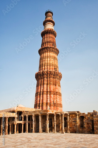 India, Delhi, Qutub Minar, low angle view of minaret photo