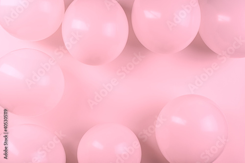 Pink balloons on pink background with copy space.Wedding or greeting card.