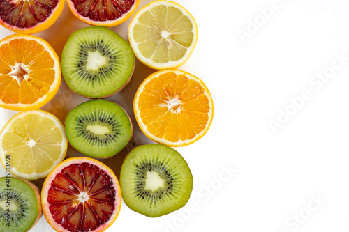 set of fruits with vitamin c  kiwi  lelon  red orange  yellow orange in a cut isolate on white