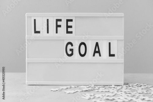 Modern board with text LIFE...