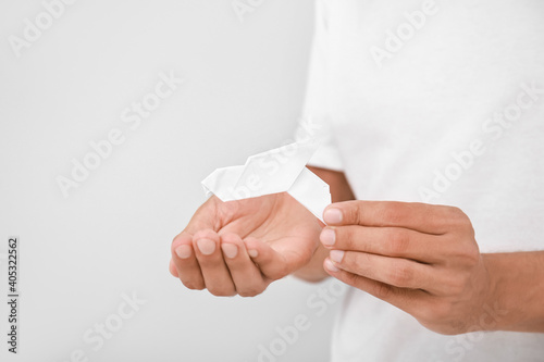 Male hands with paper dove ...