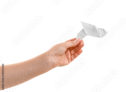 Child's hand with paper dov...
