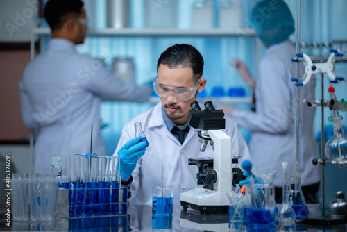 group of laboratory assista...