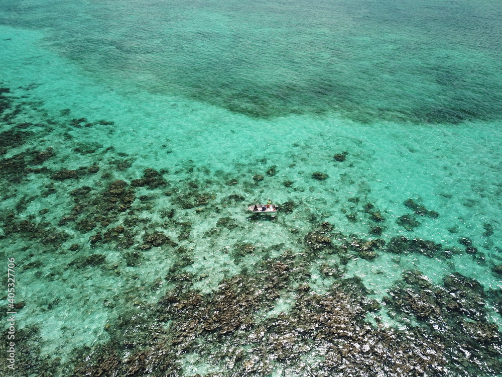 Fishermen fishing in the Caribbean Sea in their boat Fishermen fishing in the Caribbean Sea in their boat