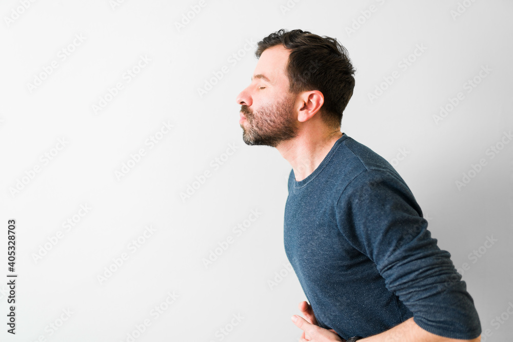Profile of an hispanic guy giving a kiss to his partner Profile of an hispanic guy giving a kiss to his partner