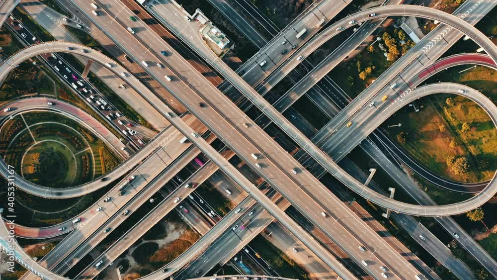 Aerial view of the cars driving on multi-level highway in Bangkok city,  direct above to the road traffic in a big city in rush hour