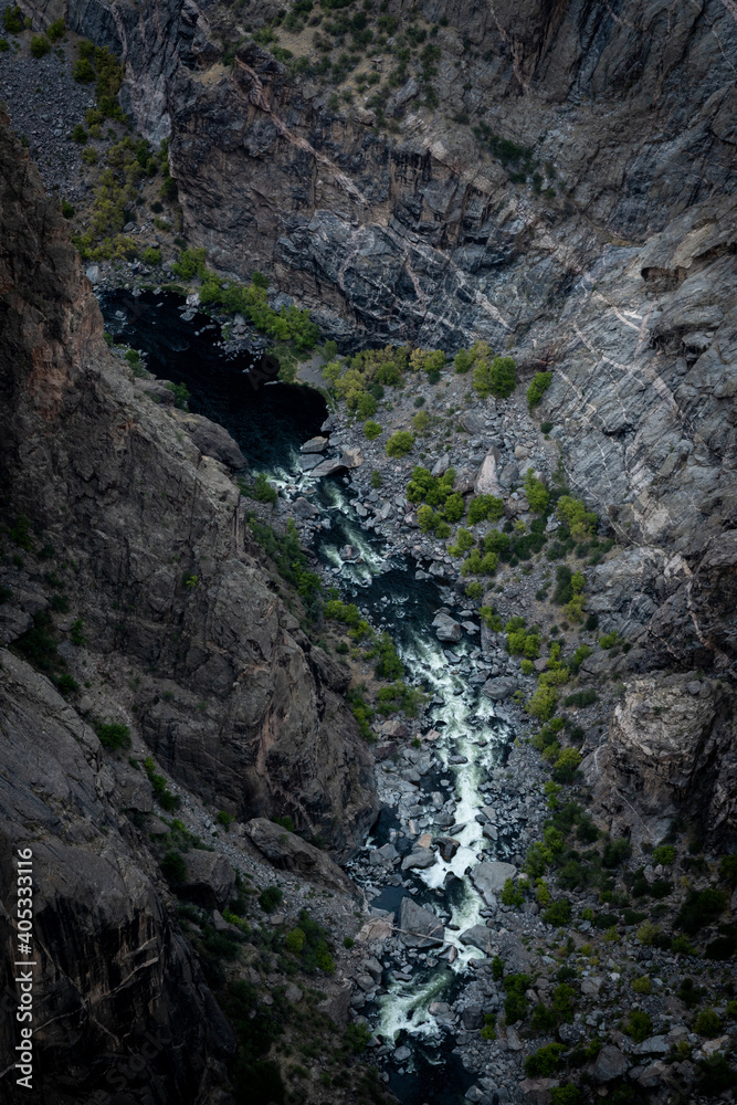 Dark Waters of The Gunnison River Rush White In The Canyon Below Dark Waters of The Gunnison River Rush White In The Canyon Below