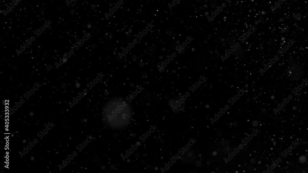 Super slow motion of natural snow falling on black background. Filmed on high speed cinema camera, 1000fps. Super slow motion of natural snow falling on black background. Filmed on high speed cinema camera, 1000fps.