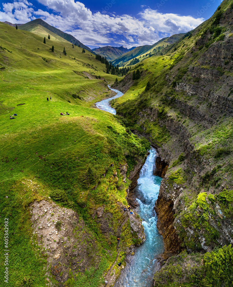 mountain valley with river and waterfall, bird's eye view mountain valley with river and waterfall, bird's eye view