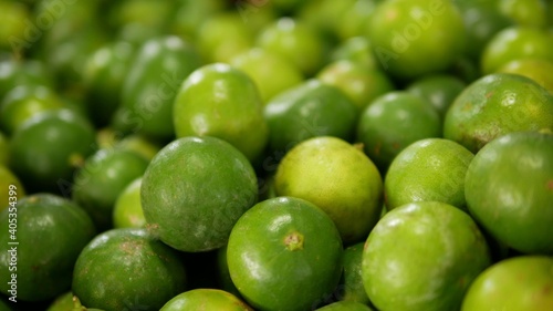 Background from fresh lime, blurry lime in market, Nature food © Veruree
