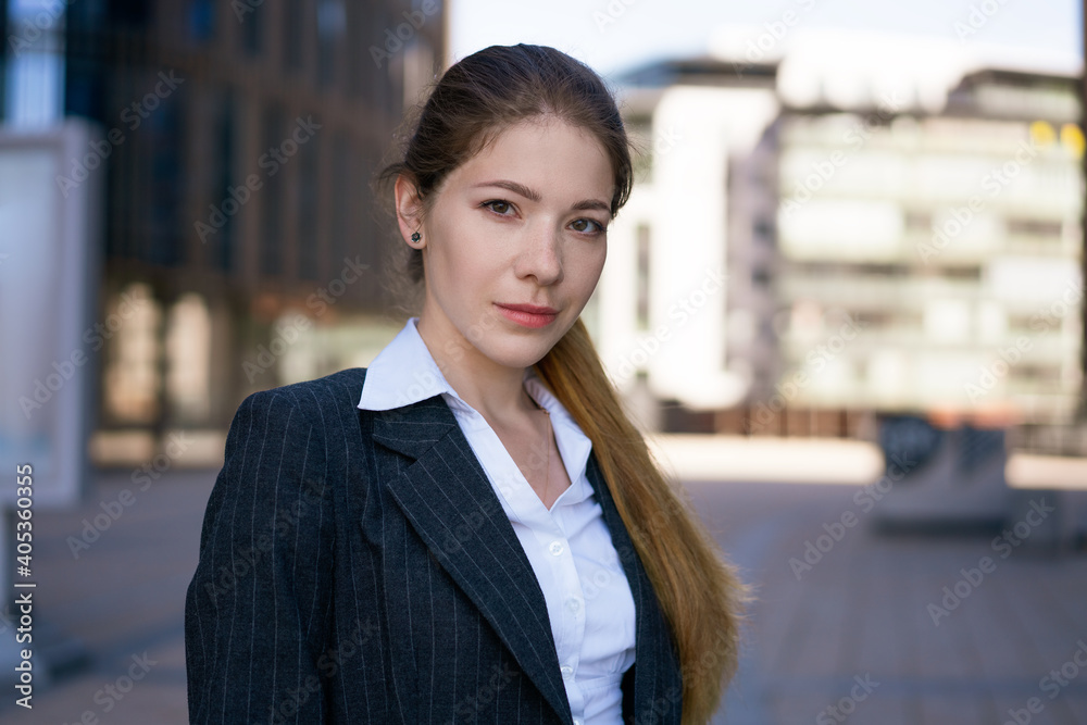 Young business woman of the office center on the street Young business woman of the office center on the street
