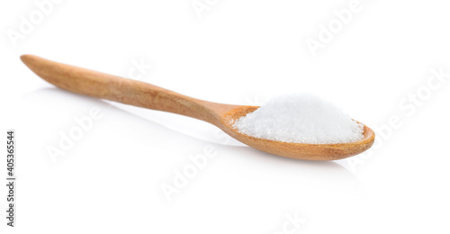 Sugar in a wooden spoon isolated on white background