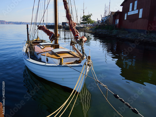 Old vintage wooden sail boat photo