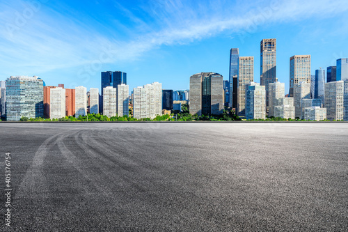 Asphalt road ground and modern city commercial buildings in Beijing,China.