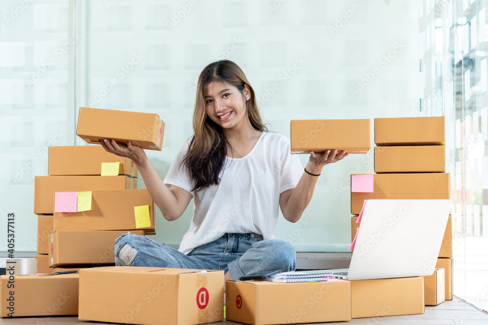 Successful Woman Entrepreneur With Parcel Boxes In Her Own Job Shopping Online Business At Home Successful Woman Entrepreneur With Parcel Boxes In Her Own Job Shopping Online Business At Home