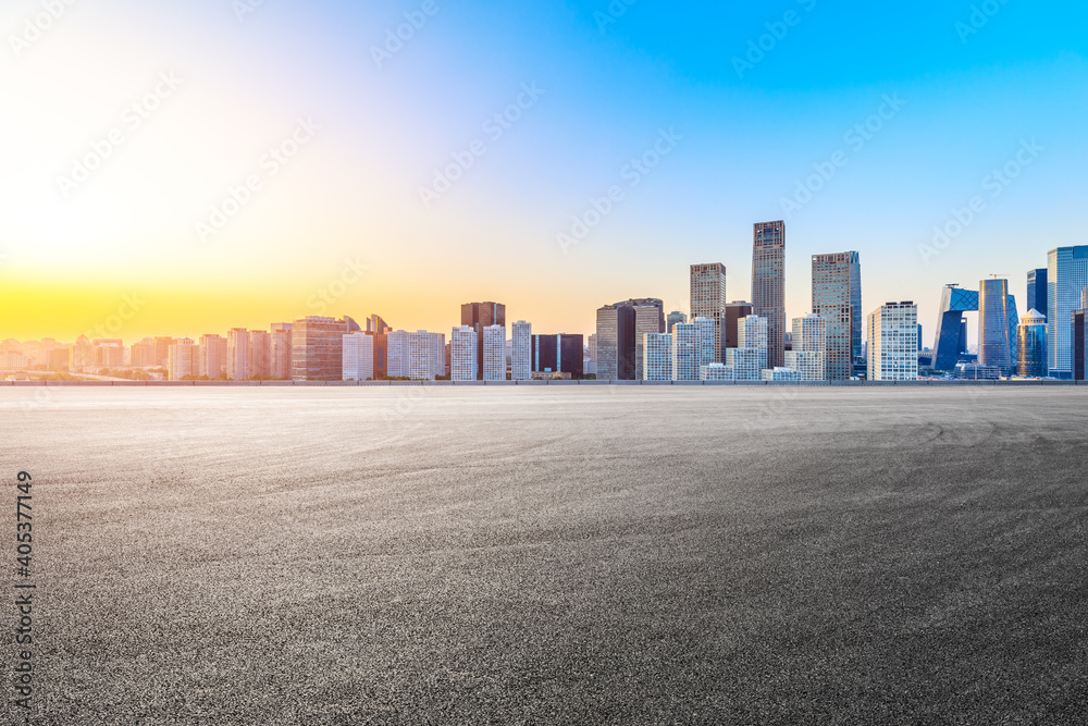 Asphalt road ground and modern city commercial buildings in Beijing,China. Asphalt road ground and modern city commercial buildings in Beijing,China.