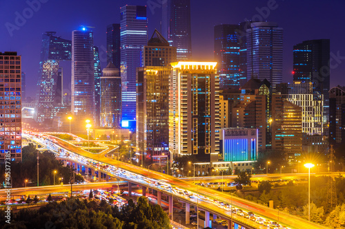 Modern city skyline and buildings in Beijing at night,China. © ABCDstock