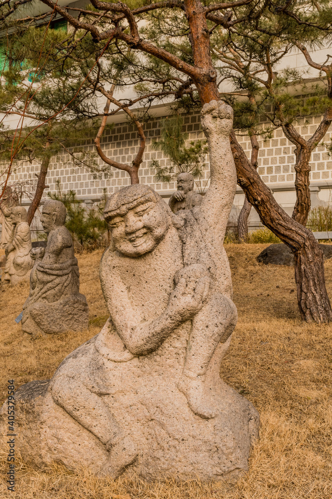 Stone carved statue of Buddhist deity.
