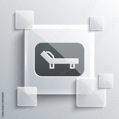 Grey Sunbed icon isolated on grey background. Sun lounger. Square glass panels. Vector.