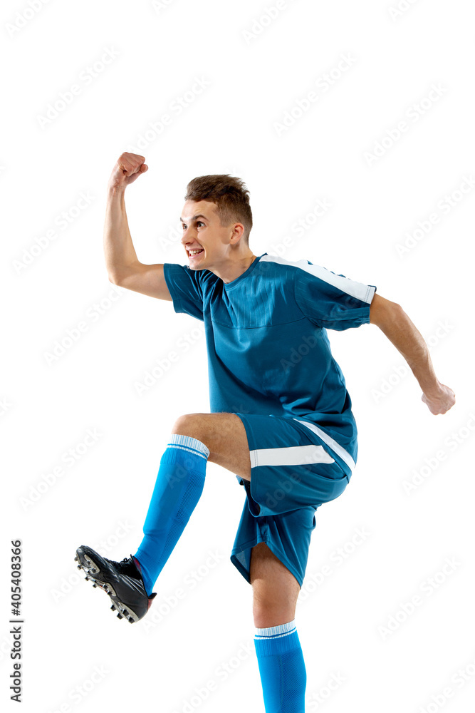 Fototapeta premium Jumping. Funny emotions of professional soccer player isolated on white studio background. Copyspace for ad. Excitement in game, human emotions, facial expression and passion with sport concept.
