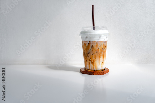 Iced caramel macchiato coffee in the cafe. photo