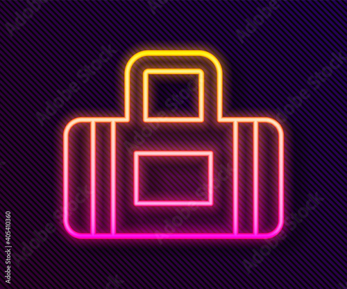 Glowing neon line Sport bag icon isolated on black background. Vector.