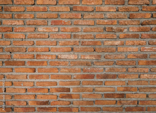Brown colored brick wall background. Building exterior design. Copy space. Wallpaper.