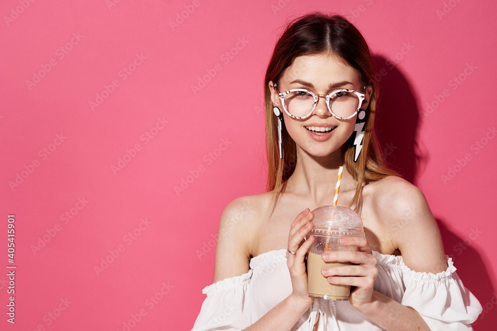 Pretty woman attractive look drink in hands charm teenager pink background Pretty woman attractive look drink in hands charm teenager pink background