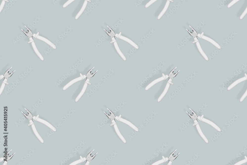 Pliers seamless pattern. Metal pliers with rubber grips.