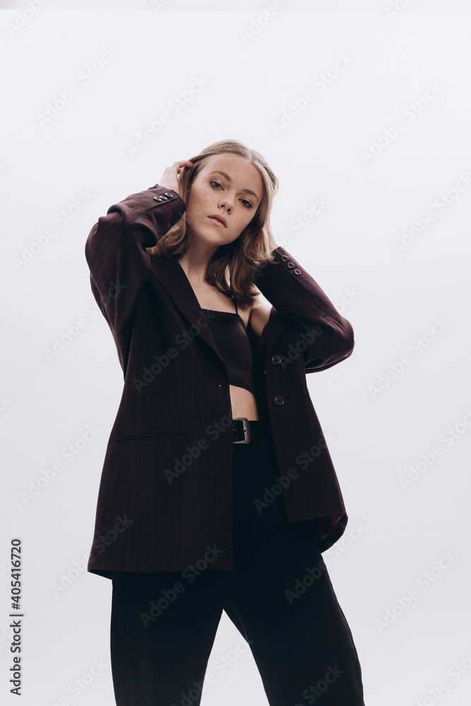 Stylish girl portrait. Young caucasian pretty beautiful slim girl isolated on white background Stylish girl portrait. Young caucasian pretty beautiful slim girl isolated on white background