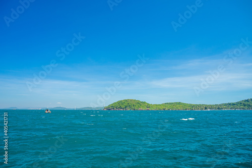 Hon Thom island in Phu Quoc, Vietnam, Asia - Tropical view with colorful houses, blue waves and blue sky, fishing boats and far away is a longest cable car