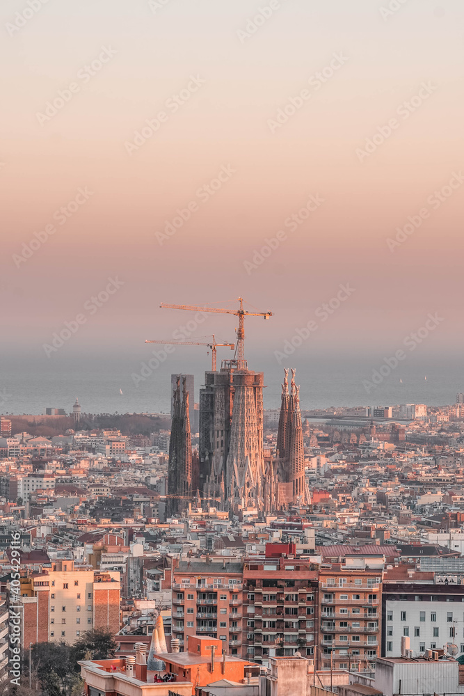 Barcelona, Spain - Feb 24, 2020: Sagrada Familia Church in sunset glow