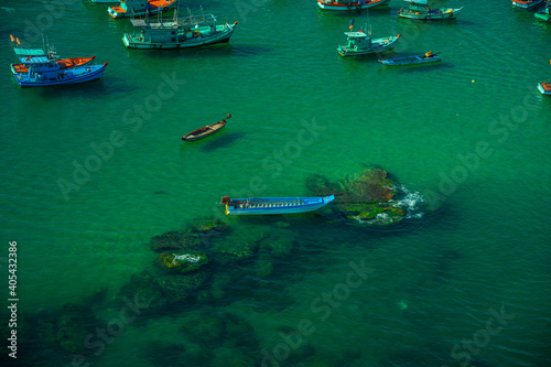 Aerial view of traditional fishermen boats lined in An Thoi harbor of Duong Dong town in the popular Phu Quoc island, Vietnam, Asia. © CravenA