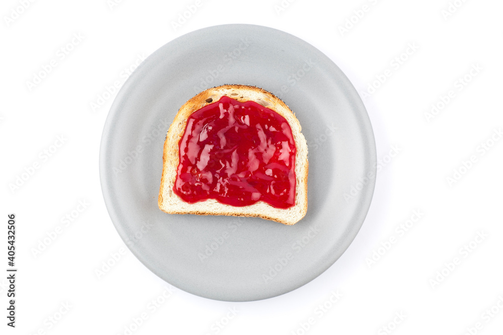 One piece of toasted bread with strawberry jam. Studio photo isolated on white background. One piece of toasted bread with strawberry jam. Studio photo isolated on white background.