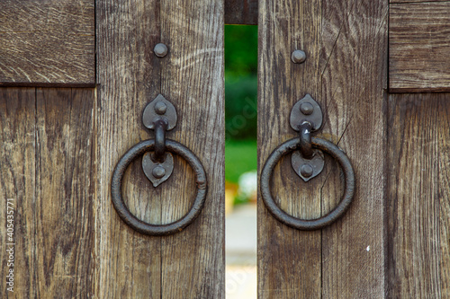 handles on old wooden gates