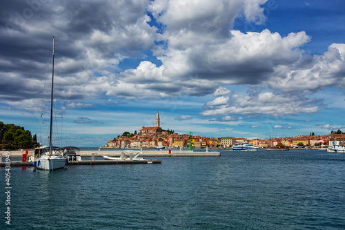 Wonderful morning view of old  Rovinj town with multicolored buildings and yachts moored along embankment, Croatia. © phant