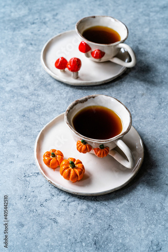 Handmade Ceramic Coffee or Tea Cups with Pumpkin and Mushroom Pattern Figure Design Handcrafted. Handicraft.