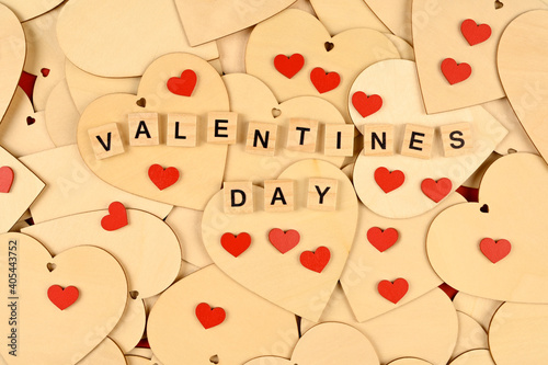 Valentine's Day background. A stack of hearts with the phrase valentines day. Valentine's Day concept. Flat view, top view, copy space
