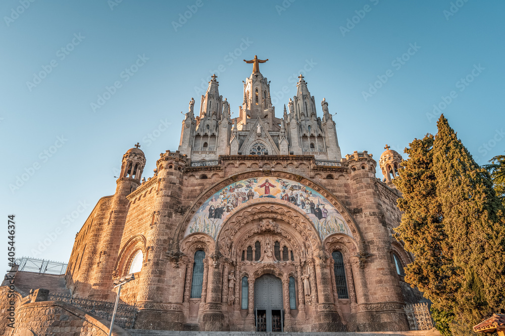 Facade of Temple of Expiatori del Sagrat Cor on Mount Tibidabo in sunset Barcelona