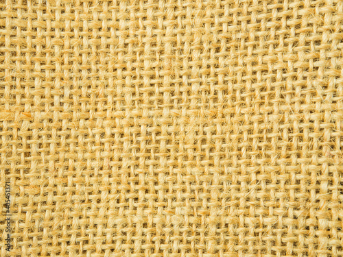 Yellow straw hat macro shot texture background.