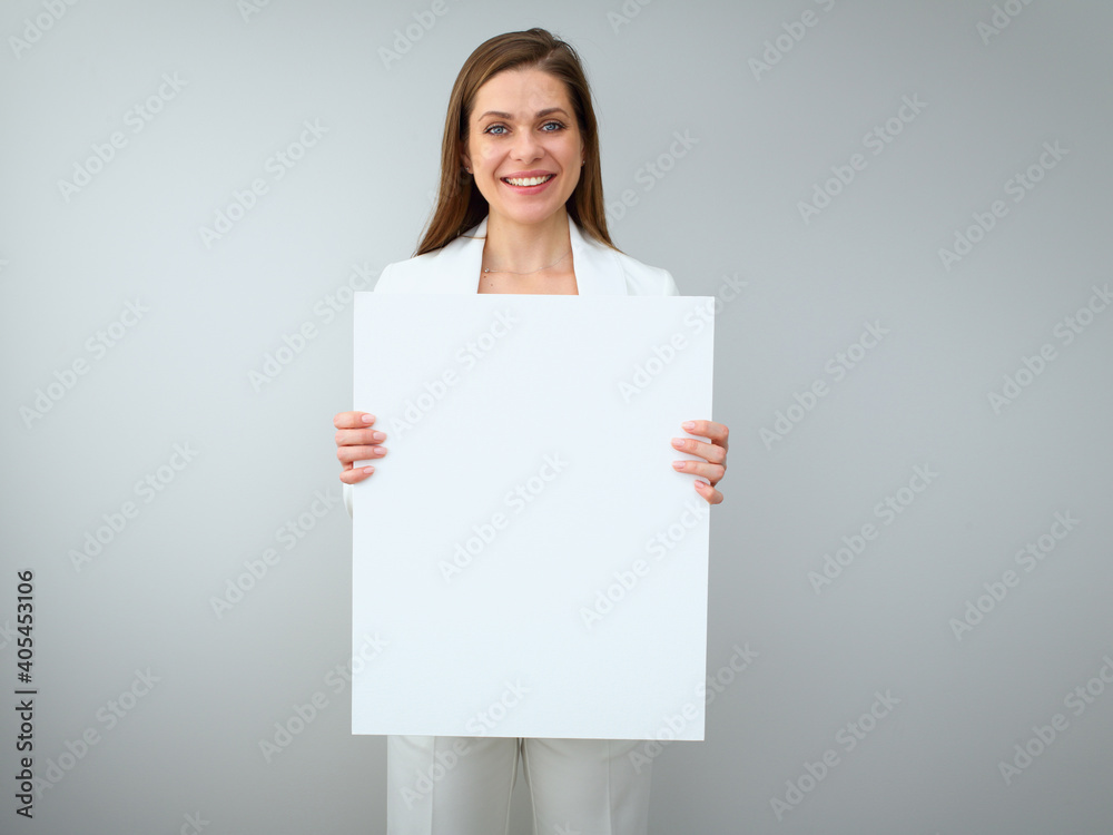 Smiling buisness woman shoving empty white banner. Smiling buisness woman shoving empty white banner.