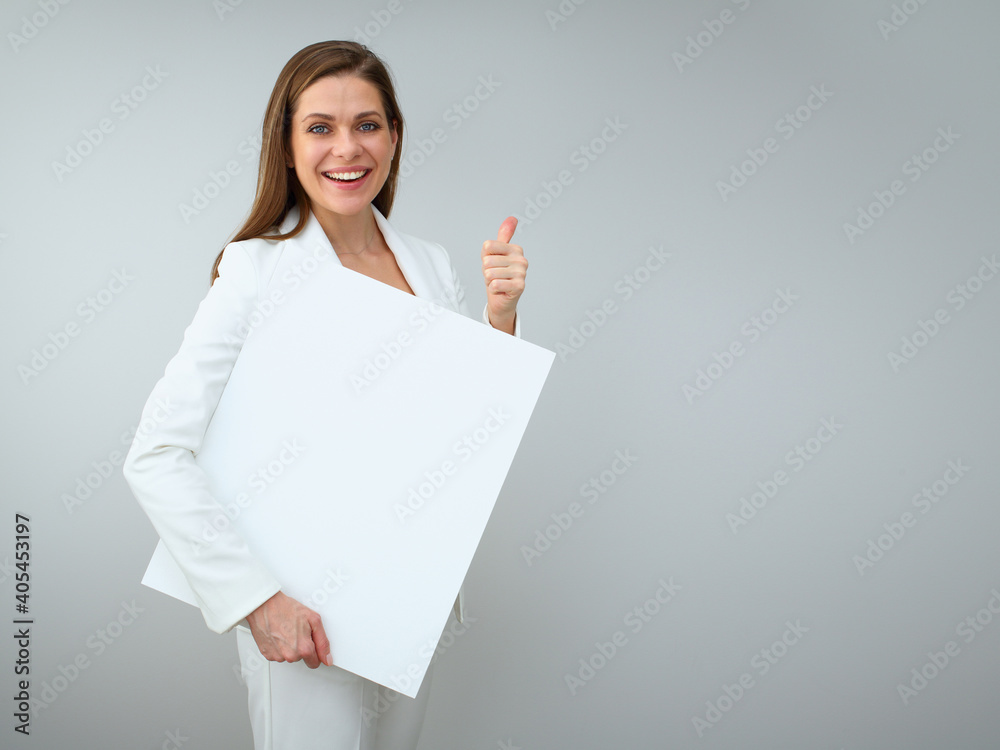 Smiling buisness woman shoving empty white banner. Smiling buisness woman shoving empty white banner.