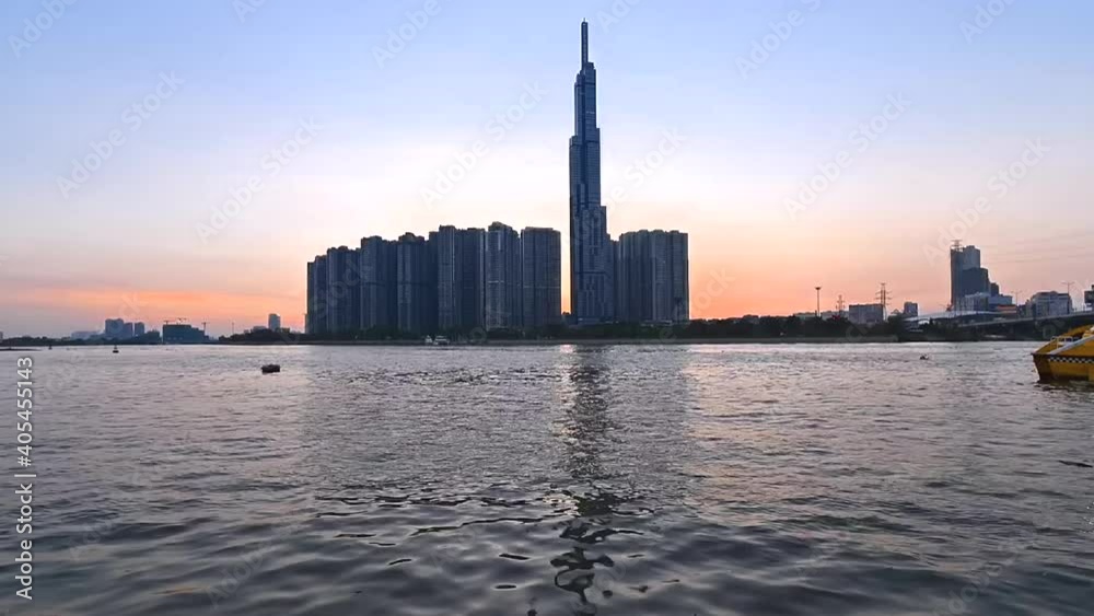 Time lapse landscape skyline sunset to night of Ho Chi Minh city or Sai Gon. Royalty high-quality stock footage time lapse Ho Chi Minh City in sunset to night. Timelapse or time lapse is fast video Time lapse landscape skyline sunset to night of Ho Chi Minh city or Sai Gon. Royalty high-quality stock footage time lapse Ho Chi Minh City in sunset to night. Timelapse or time lapse is fast video