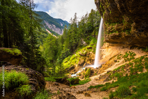 Long exposure of the Pericnik slap or Pericnik Fall, Triglav National Park, Slovenia. It is a big waterfall that falls from the cascade. photo
