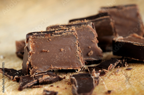 Pieces of chocolate candy closeup. Shallow depth of field